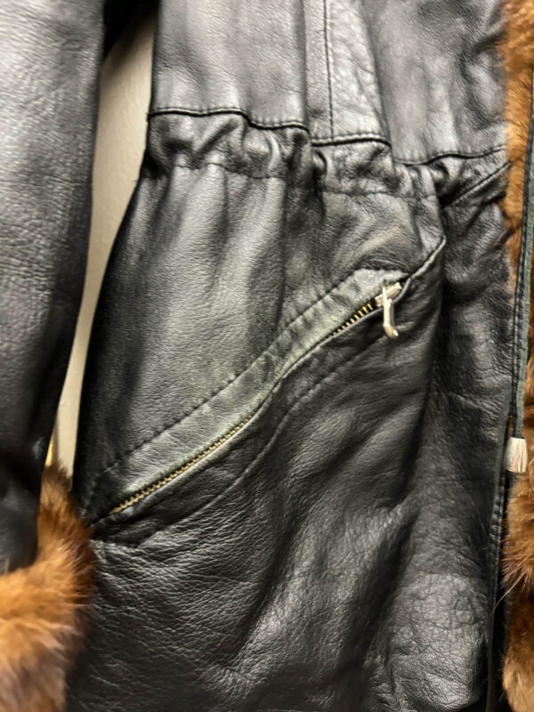 Giacca in pelle con pelliccia donna